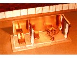 Model of Moses` Tabernacle in the Wilderness, with the coverings and a side removed.